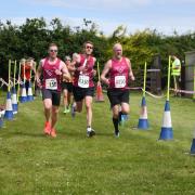 Mark Armstrong, Matt Webster and David Powles finish the Alex Moore Relay