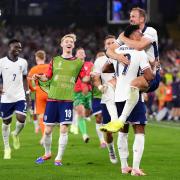 England's Harry Kane and Ollie Watkins celebrate following the UEFA Euro 2024 semi-final match at the BVB Stadion Dortmund.