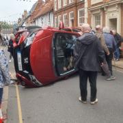 A car overturned during a crash in Walsingham High Street