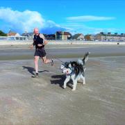 Neil Featherby out on a training run on the coast