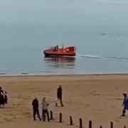 Five people became stuck on Scolt Head Island on Saturday afternoon