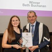 Beth Buchanan collects her award from RCGP president Richard Vautrey