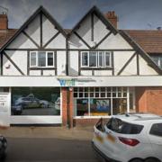 Villagers have written angry messages on a closure sign at Well Pharmacy in Brundall