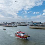 The Grace Darling, one of North Star’s hybrid daughter craft fleet, passes the mouth of Lowestoft port