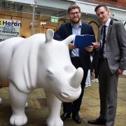 Adam Claydon, left, and Jake Roode, of Loveday & Partners, sponsors of the rhino GoGo Safari sculpture, at the event to choose their artist and design.