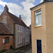 The grey house on Priory Lane in King's Lynn