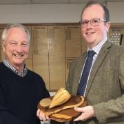 John Lowe (left) receiving Stoke Ferry Agricultural Society's sugar beet prize from Alistair Wright of BBRO