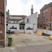 The derelict site that could house flats is for sale