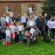 Families at the end of their march to save Brancaster CofE Primary Academy