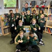 Heather Avenue headteacher Stacey Coleman and pupils celebrate its Ofsted result