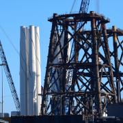 Old and new: Great Yarmouth's decommissioning yard with jackets from southern North Sea gas platforms to be dismantled and disposed of alongside offshore wind farm towers to be installed off the East coast