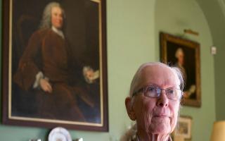 Mannington Hall Gardening Feature with Lord and Lady Walpole. Lord Robin Walpole in front of a portrait of Horatio Walpole. 

Picture: MARK BULLIMORE