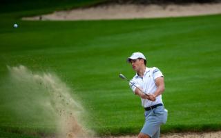 Ed Featherstone splashes out ahead of saving par during the final round at Eaton