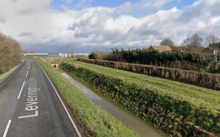 A school bus carrying children overturned into a ditch