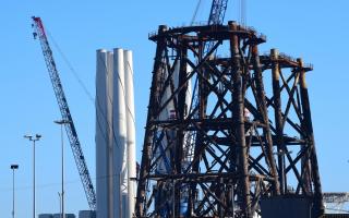 Old and new: Great Yarmouth's decommissioning yard with jackets from southern North Sea gas platforms to be dismantled and disposed of alongside offshore wind farm towers to be installed off the East coast